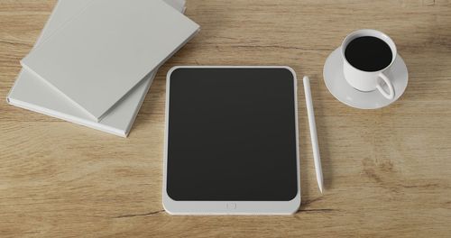 High angle view of coffee cup on table