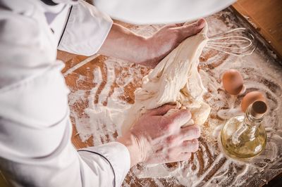 Midsection of woman preparing food