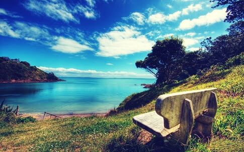 sky, tranquil scene, tranquility, water, scenics, grass, beauty in nature, nature, cloud - sky, tree, cloud, lake, sea, idyllic, horizon over water, lakeshore, blue, non-urban scene, remote, outdoors