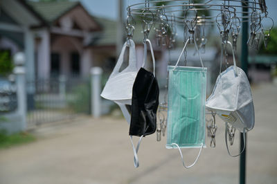 Close-up of clothes hanging on rope