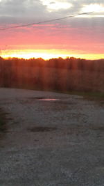 Scenic view of landscape against sky during sunset