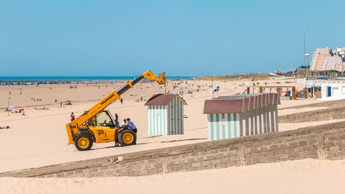 Scenic view of beach against clear sky