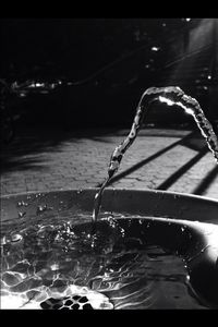 Close-up of water splashing on white background
