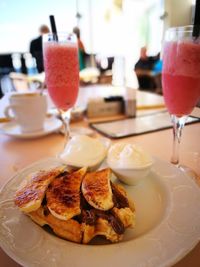 Close-up of drink served on table