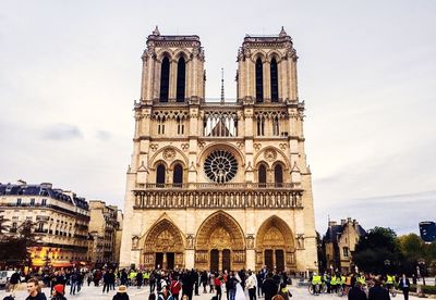 Tourists in front of historic building