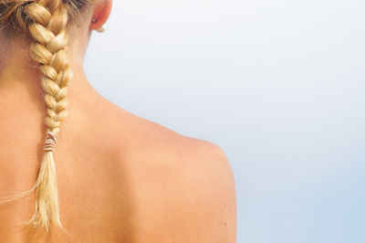 Cropped image of woman with braided hair