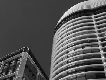 Low angle view of modern building against clear sky