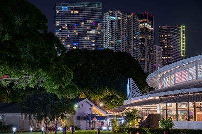 Illuminated buildings in city at night