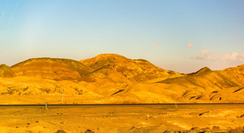 Scenic view of desert against sky