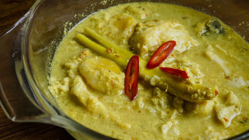 Telur masak lemak cili padi or egg in coconut with birds eye chilli.