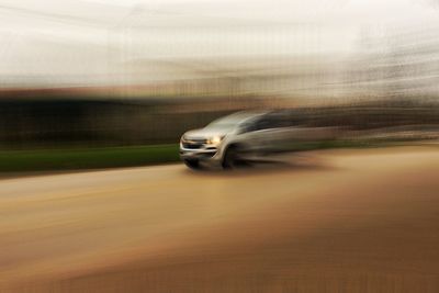 Car moving on road in city