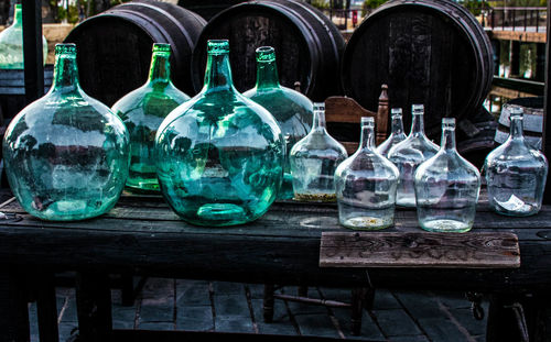 Close-up of glass bottles on table