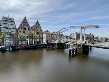 Bridge over river against sky