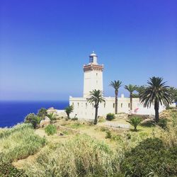 View of lighthouse against blue sky