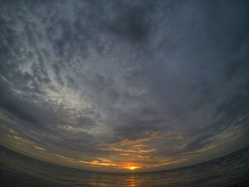 Scenic view of dramatic sky during sunset