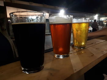 Close-up of beer glass on table