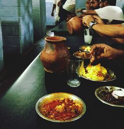 Close-up of man eating food