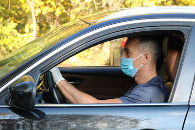 Driver with mask and gloves