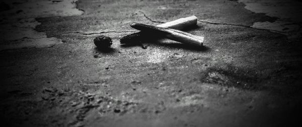 High angle view of old pencils on floor