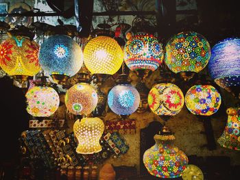 Multi colored decorated for sale at market stall