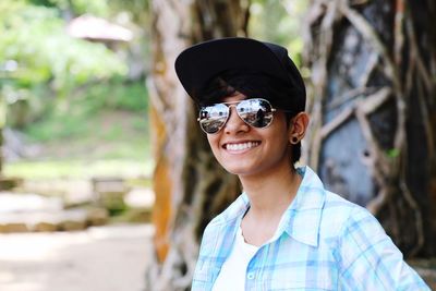 Portrait of smiling boy wearing sunglasses