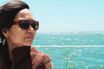 Close-up of thoughtful woman traveling in boat