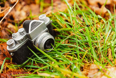 Close-up of camera on field