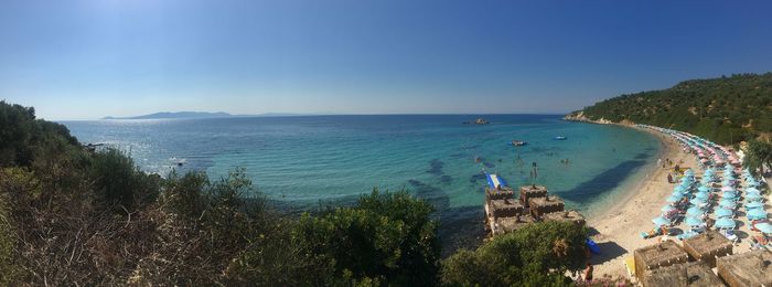 High angle view of sea against blue sky