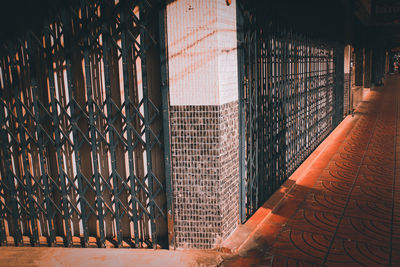 Metal gate against building