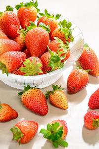 Close-up of strawberries in bowl on table