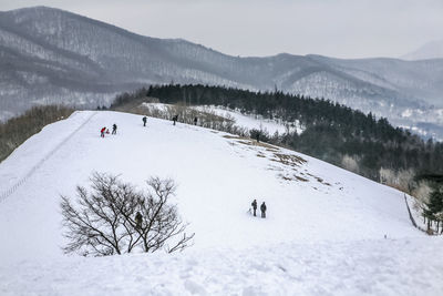 Scenic view of snow covered mountains