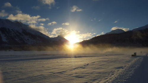 Scenic view of snowcapped mountain against sky