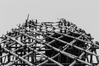 Low angle view of metallic structure against clear sky