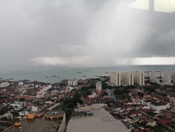 High angle view of buildings against sky