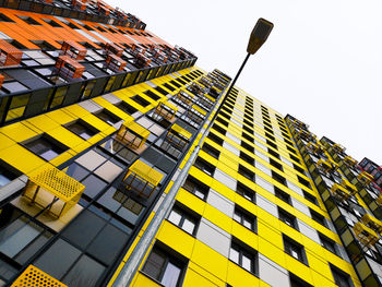 Low angle view of modern building against clear sky