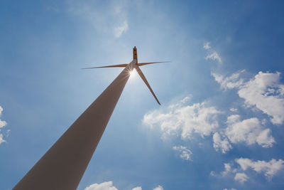 Low angle view of wind turbine against sky