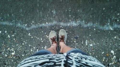 Low section of woman in water