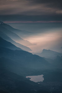 Scenic view of mountains against sky during sunset