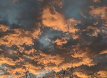 Low angle view of dramatic sky during sunset