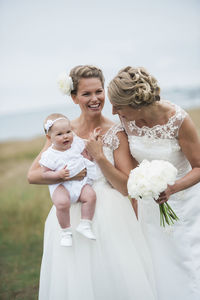 Brides with baby girl