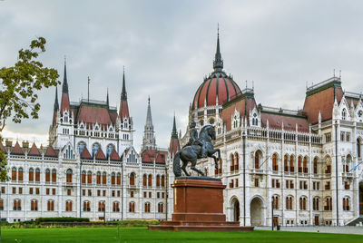 Hungarian parliament building was designed in neo-gothic style and opened in 1902, budapest, hungary