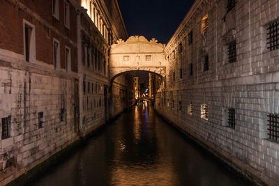 Man in illuminated city