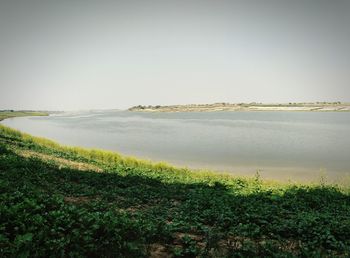 Scenic view of sea against clear sky