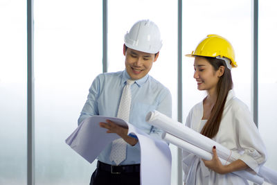 Young woman working with umbrella