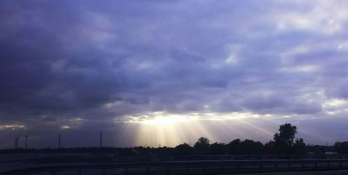 Low angle view of cloudy sky at sunset