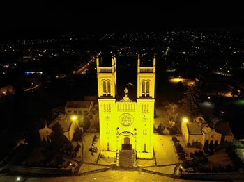 High angle view of illuminated city buildings at night