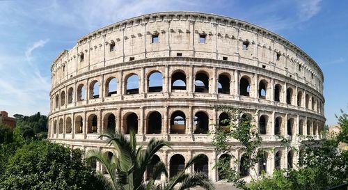 Low angle view of colosseum  historical building against sky