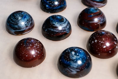 High angle view of multi colored candies on table