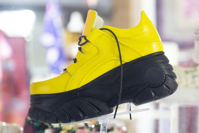 Close-up of yellow shoe for sale