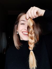 Portrait of a smiling young woman
